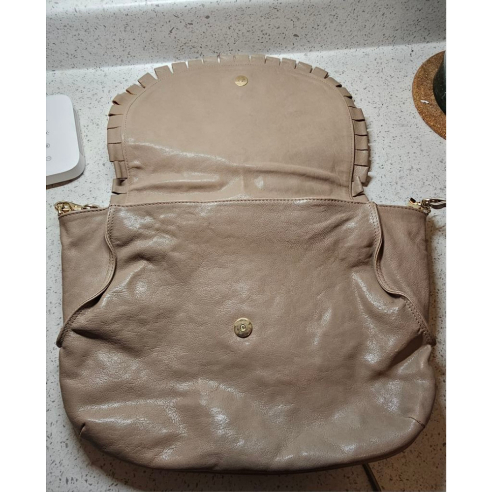 Charming Red(V) leather 2 way wear cross-body with a stylish fringe bow detail - Picture 12 of 12